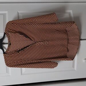 Geometric blouse with zipper detail